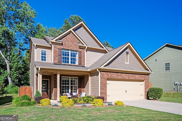 3537 Edenridge Ct, Buford, GA 30519 - craftsman-style house with brick siding, driveway, a garage, a porch, and a shingled roof