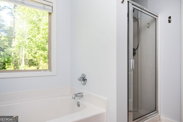 3537 Edenridge Ct, Buford, GA 30519 - full bath with plenty of natural light, a stall shower, and a garden tub
