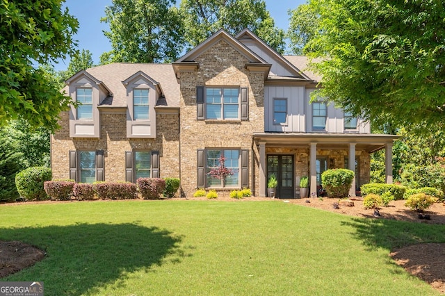 2470 Anderson Estates Ct, Marietta, GA 30064 - view of front of property featuring a front yard, board and batten siding, and brick siding