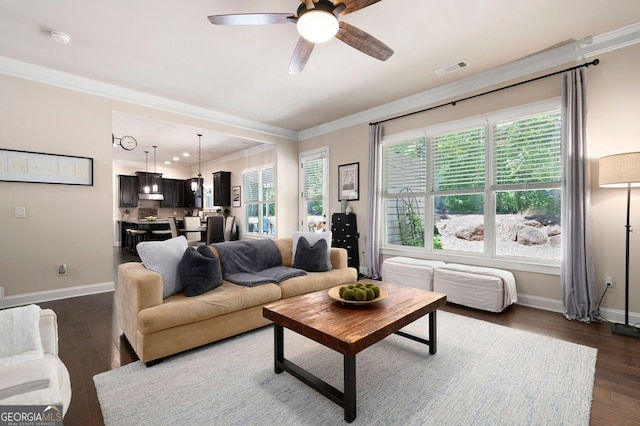 2470 Anderson Estates Ct, Marietta, GA 30064 - living area featuring crown molding, baseboards, a ceiling fan, and dark wood-style flooring
