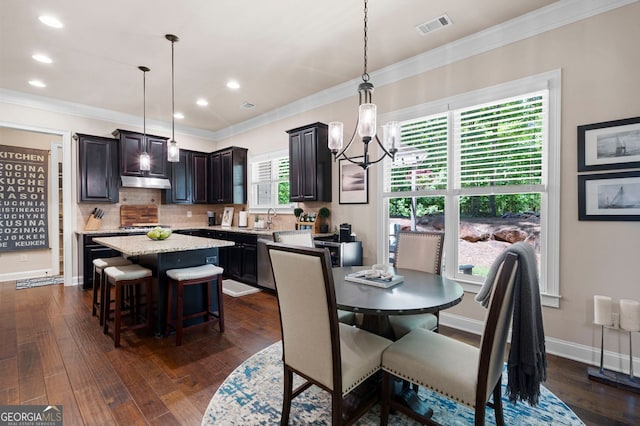 2470 Anderson Estates Ct, Marietta, GA 30064 - dining space with a chandelier, dark wood finished floors, ornamental molding, recessed lighting, and baseboards