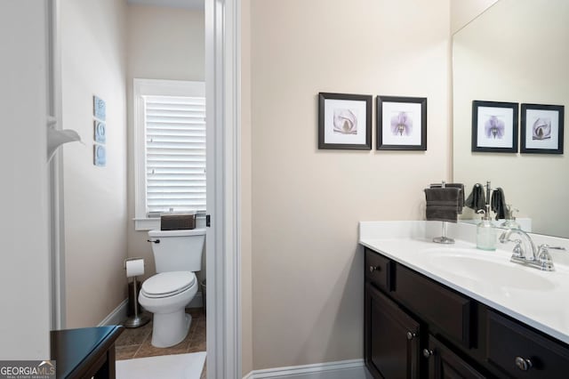2470 Anderson Estates Ct, Marietta, GA 30064 - bathroom featuring vanity, toilet, baseboards, and tile patterned flooring