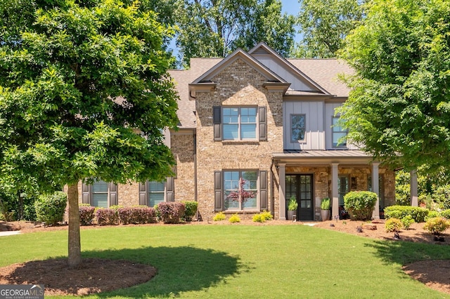 2470 Anderson Estates Ct, Marietta, GA 30064 - craftsman house featuring a front lawn, board and batten siding, and a shingled roof