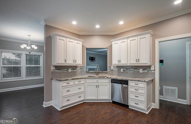 217 Huntington Shoals Dr, Athens, GA 30606 - kitchen with dishwasher, a sink, a chandelier, tasteful backsplash, and white cabinets