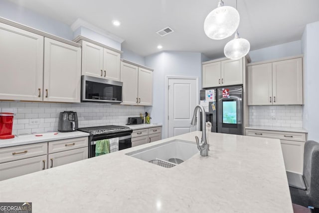 55 Clubhouse Way, Acworth, GA 30101 - kitchen with appliances with stainless steel finishes, hanging light fixtures, tasteful backsplash, and recessed lighting