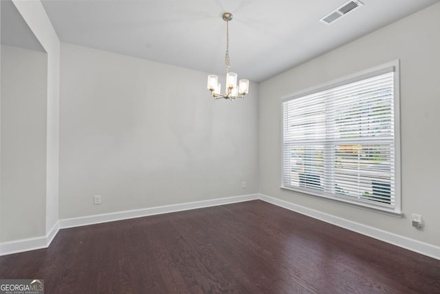 55 Clubhouse Way, Acworth, GA 30101 - spare room featuring dark wood-style floors and a chandelier