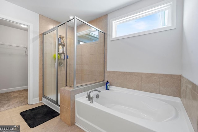 55 Clubhouse Way, Acworth, GA 30101 - bathroom with a garden tub, a shower stall, and a walk in closet