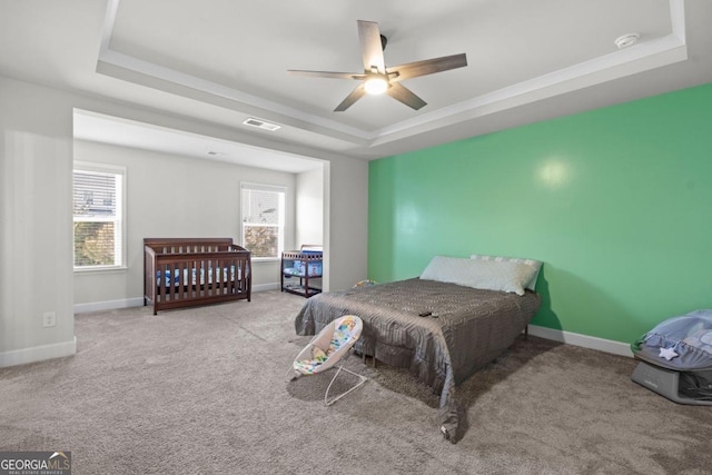 55 Clubhouse Way, Acworth, GA 30101 - bedroom with a raised ceiling, multiple windows, carpet floors, and a ceiling fan