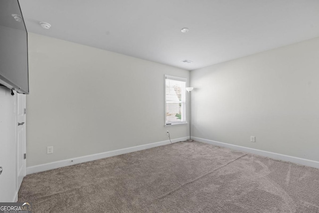 55 Clubhouse Way, Acworth, GA 30101 - spare room with a smoke detector and carpet