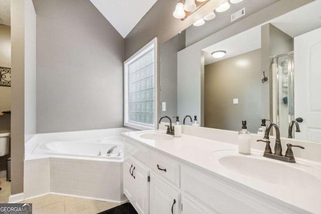25 Grange Ct, Sharpsburg, GA 30277 - full bath with a bath, double vanity, tile patterned floors, a stall shower, and lofted ceiling