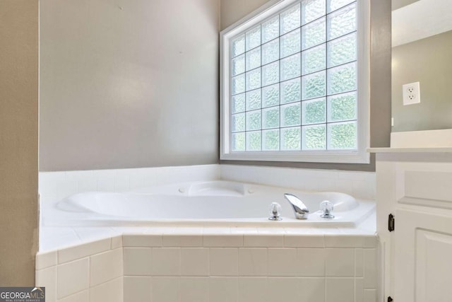 25 Grange Ct, Sharpsburg, GA 30277 - bathroom featuring a garden tub and vanity