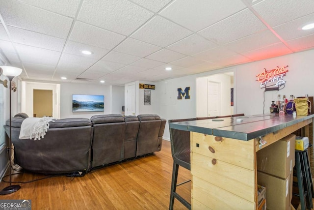 25 Grange Ct, Sharpsburg, GA 30277 - living area featuring light wood-style flooring, a drop ceiling, and recessed lighting