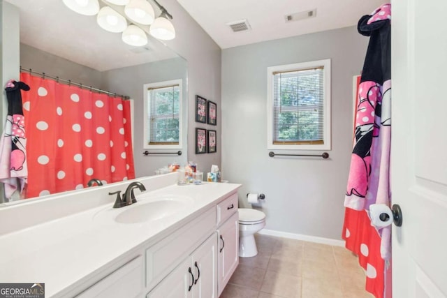 25 Grange Ct, Sharpsburg, GA 30277 - bathroom with plenty of natural light, vanity, tile patterned floors, and a shower with shower curtain