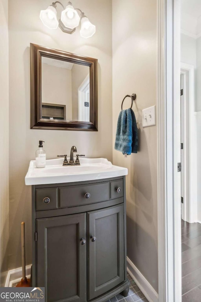 25 Grange Ct, Sharpsburg, GA 30277 - bathroom with vanity and baseboards