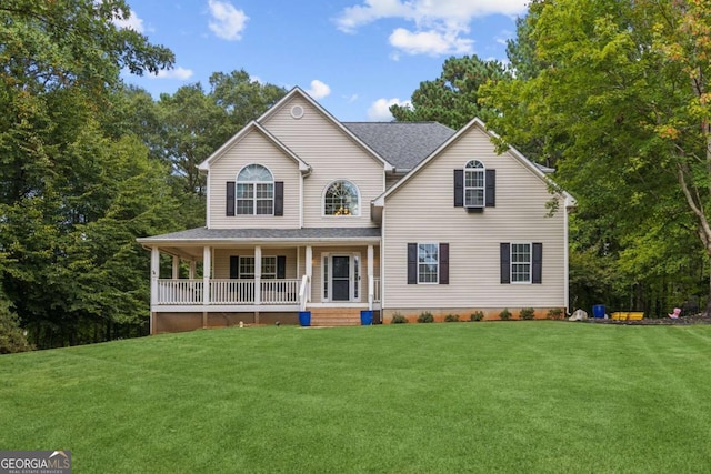25 Grange Ct, Sharpsburg, GA 30277 - view of front of house featuring covered porch and a front yard