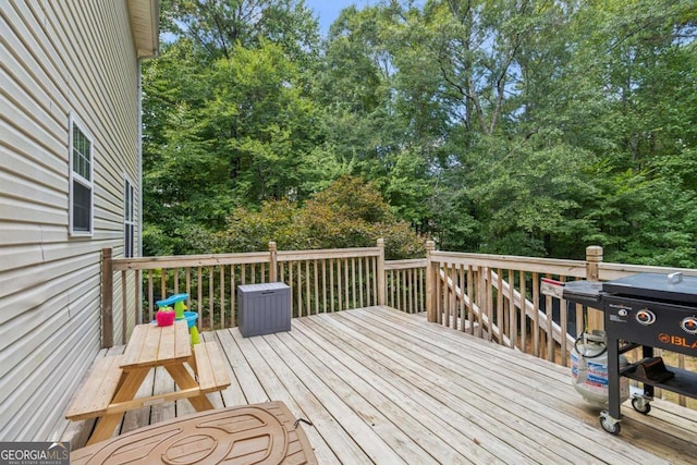 25 Grange Ct, Sharpsburg, GA 30277 - wooden terrace with grilling area and view of scattered trees