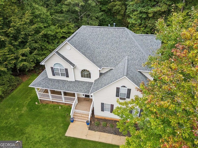 25 Grange Ct, Sharpsburg, GA 30277 - view of front of home with roof with shingles and a front yard