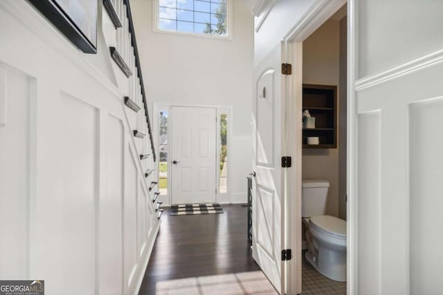 25 Grange Ct, Sharpsburg, GA 30277 - entryway with a towering ceiling and dark wood-style flooring