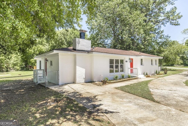 108 Holly St, Warner Robins, GA 31093 - view of front of home with a chimney and a gate