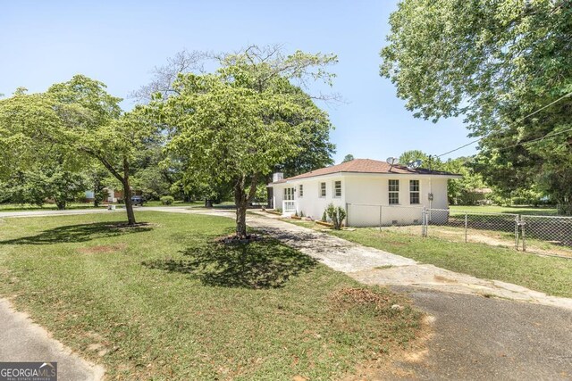 108 Holly St, Warner Robins, GA 31093 - view of grassy yard with a deck