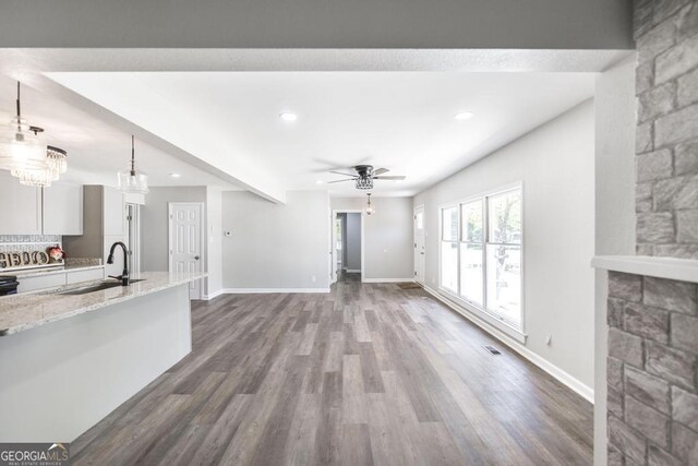 108 Holly St, Warner Robins, GA 31093 - unfurnished living room with a sink, ceiling fan, dark wood finished floors, recessed lighting, and baseboards