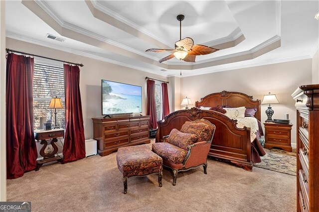 1070 Cureton Dr, Austell, GA 30106 - bedroom with a raised ceiling, carpet, ornamental molding, and a ceiling fan