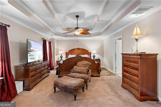1070 Cureton Dr, Austell, GA 30106 - bedroom featuring light carpet, crown molding, a tray ceiling, and a ceiling fan