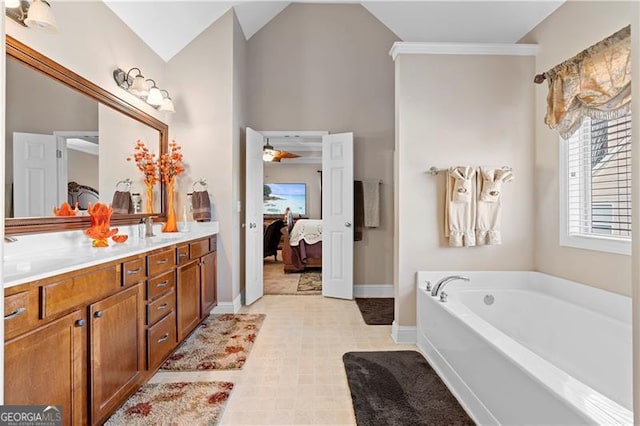 1070 Cureton Dr, Austell, GA 30106 - bathroom with connected bathroom, a garden tub, and double vanity