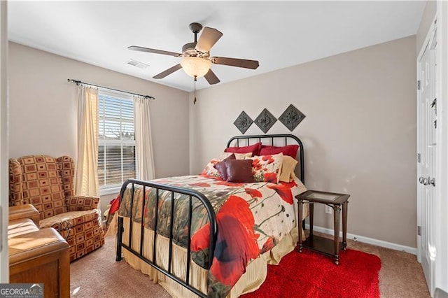 1070 Cureton Dr, Austell, GA 30106 - carpeted bedroom featuring a ceiling fan