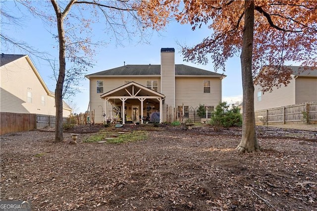 1070 Cureton Dr, Austell, GA 30106 - back of property featuring a chimney
