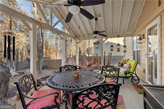 1070 Cureton Dr, Austell, GA 30106 - sunroom / solarium featuring outdoor dining area, ceiling fan, and healthy amount of natural light