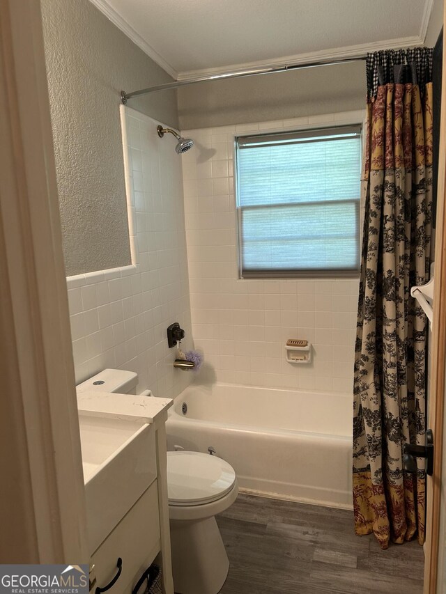 815 W Crawford St, Dalton, GA 30720 - full bathroom featuring crown molding, shower / bath combination with curtain, wood finished floors, toilet, and vanity