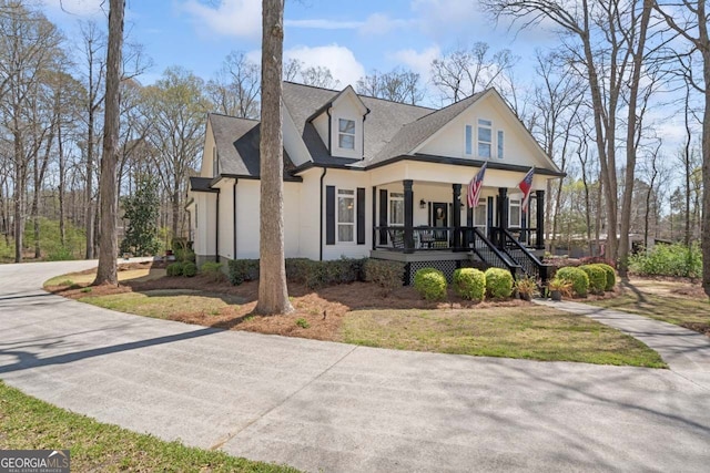 595 S Antioch Rd, Mcdonough, GA 30252 - view of front of house featuring covered porch and stairs