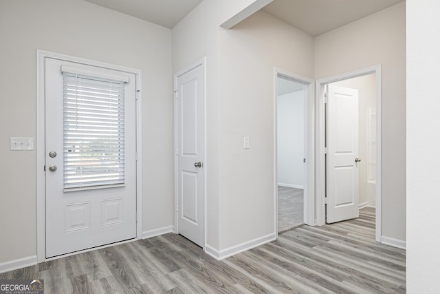 305 Limestone Circcle, Conyers, GA 30013 - entryway featuring wood finished floors and baseboards