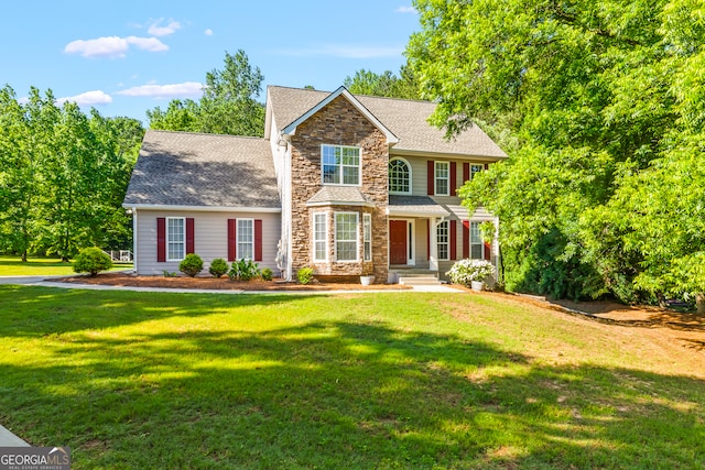 220 Drumcliff Ct, Tyrone, GA 30290 - view of front of home with stone siding, a front lawn, and a shingled roof