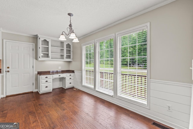 220 Drumcliff Ct, Tyrone, GA 30290 - unfurnished office with a textured ceiling, a chandelier, crown molding, dark wood-type flooring, and wainscoting