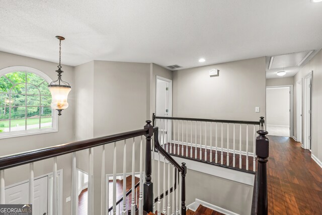 220 Drumcliff Ct, Tyrone, GA 30290 - corridor featuring attic access, an upstairs landing, dark wood-style floors, recessed lighting, and baseboards