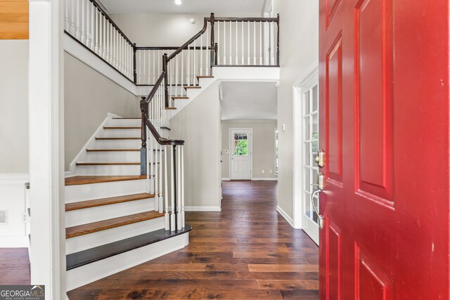 220 Drumcliff Ct, Tyrone, GA 30290 - entryway with dark wood-style flooring, a towering ceiling, stairs, baseboards, and recessed lighting