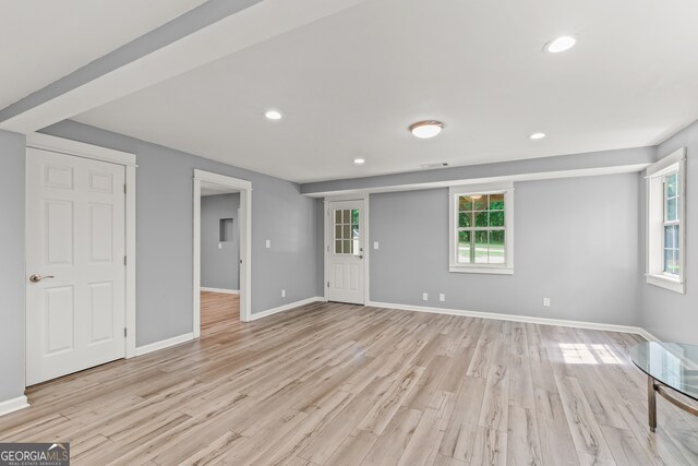 220 Drumcliff Ct, Tyrone, GA 30290 - unfurnished living room with light wood-style floors, baseboards, and recessed lighting