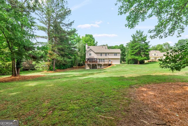 220 Drumcliff Ct, Tyrone, GA 30290 - view of grassy yard featuring a wooden deck