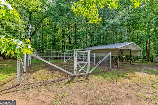 220 Drumcliff Ct, Tyrone, GA 30290 - view of outdoor structure featuring a detached carport and a gate