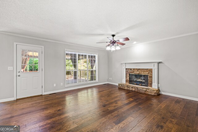 220 Drumcliff Ct, Tyrone, GA 30290 - unfurnished living room with hardwood / wood-style flooring, plenty of natural light, ornamental molding, a ceiling fan, and a textured ceiling