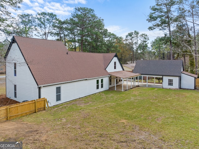 9 Wimbledon Ct, Statesboro, GA 30458 - rear view of property with a carport, a patio, and a shingled roof