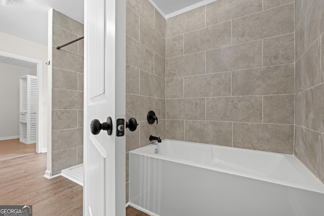 9 Wimbledon Ct, Statesboro, GA 30458 - bathroom featuring wood finished floors, baseboards, and  shower combination