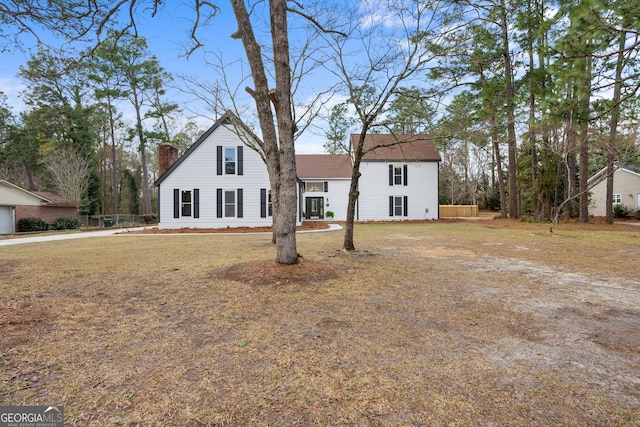 9 Wimbledon Ct, Statesboro, GA 30458 - view of front facade featuring a chimney
