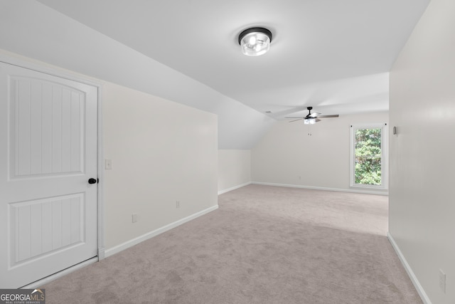 9 Wimbledon Ct, Statesboro, GA 30458 - bonus room featuring carpet, ceiling fan, baseboards, and lofted ceiling