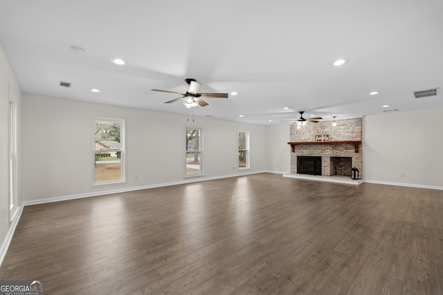9 Wimbledon Ct, Statesboro, GA 30458 - unfurnished living room featuring ceiling fan, a fireplace, dark wood finished floors, recessed lighting, and baseboards