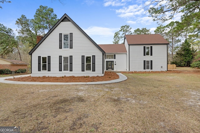 9 Wimbledon Ct, Statesboro, GA 30458 - view of side of property with a chimney and a shingled roof