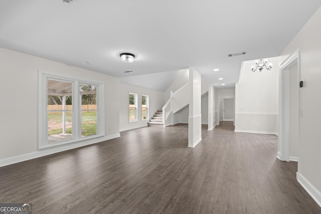 9 Wimbledon Ct, Statesboro, GA 30458 - unfurnished living room featuring dark wood-style flooring, stairs, baseboards, a chandelier, and recessed lighting
