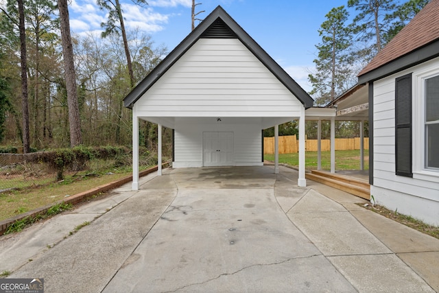 9 Wimbledon Ct, Statesboro, GA 30458 - view of parking / parking lot featuring a carport and concrete driveway